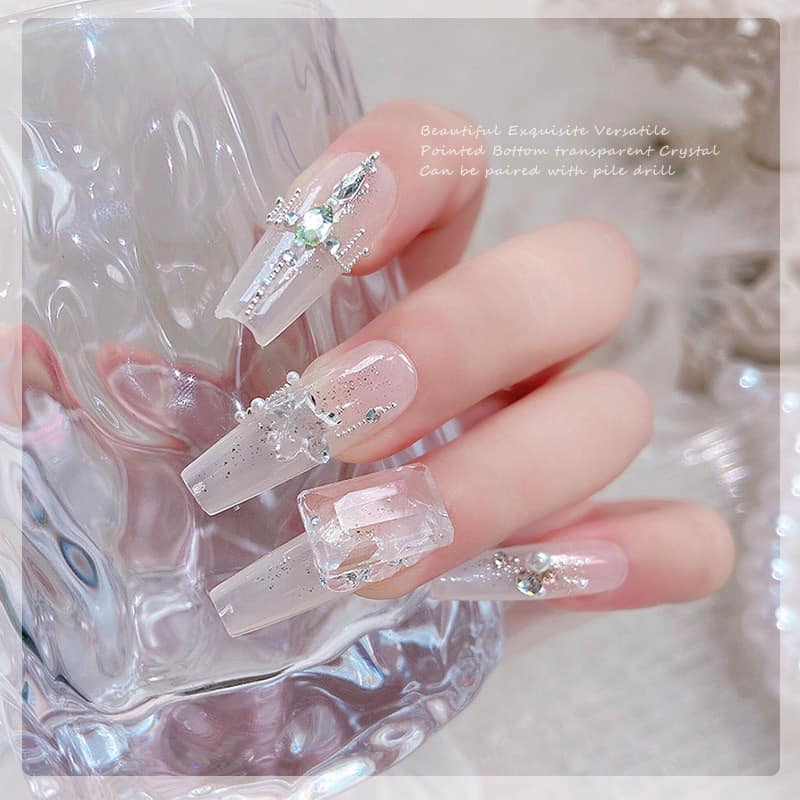 Transparent stone for nail decoration.